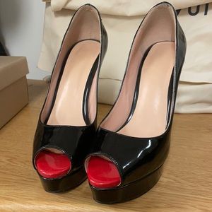 Red bottoms NOT LOUBOUTIN, not branded or replica!